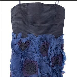 Never worn, this dress is not good for smaller bust. No stretch.